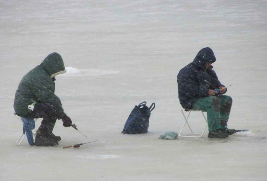 Ice fishing at Kaisaniemi Bay in Helsinki illustration for the Polar Daylight Wellbeing Guide in an article about Seasonal Affective Disorder, fatty-fish and omega-3 as circadian time cues